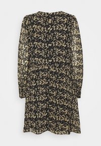 Black dress with long sleeves, featuring an abstract tan and cream pattern. Flowy fabric with a round neckline and gathered waist.