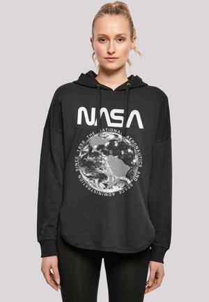 Black hoodie featuring a NASA logo and Earth graphic. Made of soft fabric, with a loose fit, drawstring hood, and rounded hem.