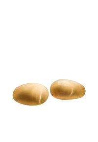 Piedras decorativas de latón con forma suave y redondeada; acabado metálico dorado con una textura cepillada. Dos piezas exhibidas una al lado de la otra.
