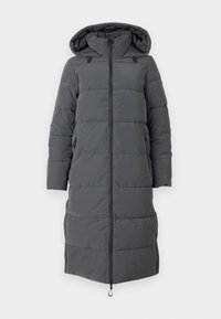 Lange, hættetrukne pufferjakke i mørkegrå. Lavet af quiltet stof med en frontlynlås, to sidelommer og et snoretræk i kanten.