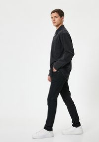 Koton BRAD - Vaqueros slim fit - black