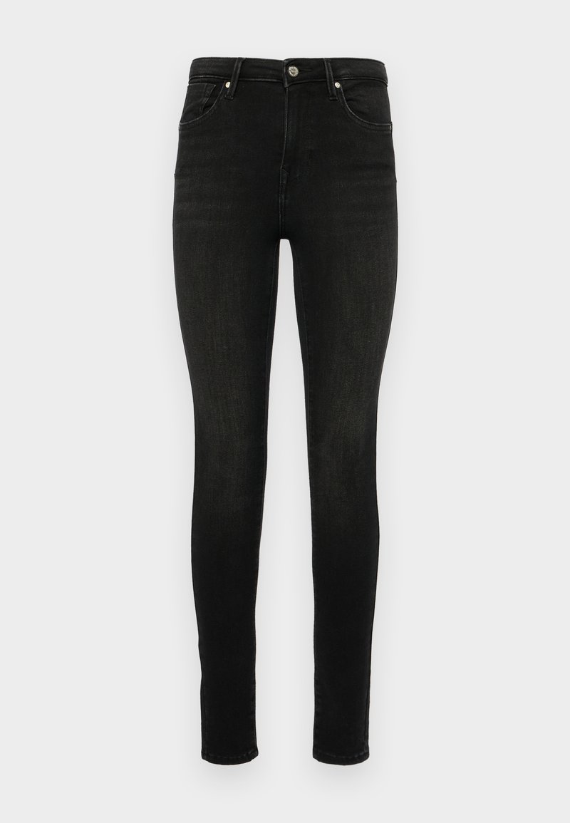 Jeans noirs skinny en denim. Design classique à cinq poches avec fermeture éclair et bouton. Texture lisse et silhouette ajustée.