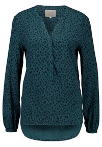 Blusa verde azulado con un patrón de leopardo, de mangas largas, escote en V y un dobladillo trasero ligeramente más largo. Fabricada con tejido suave.