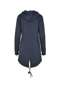 Sweat à capuche en bleu marine foncé, manches longues, avec des zips aux poignets, un ourlet à cordon de serrage et un dos arrondi avec une légère fente.