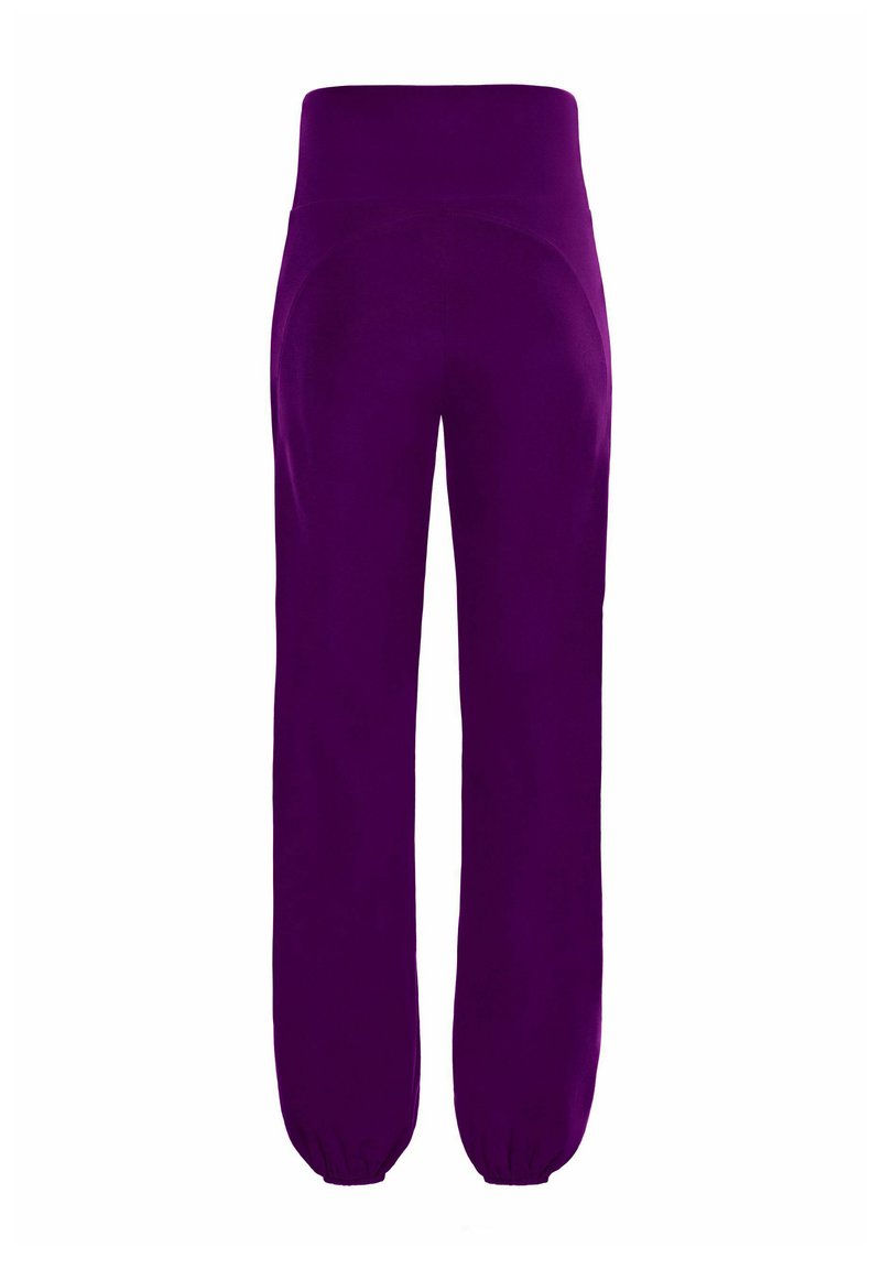 Winshape Tracksuit bottoms - dark plum/dark purple - Zalando