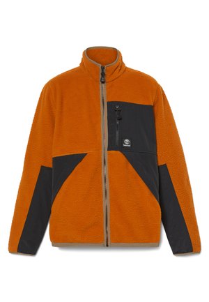 Orange fleece jacket with a high collar, black accent panels, front zipper, and a chest pocket featuring a logo. Textured fabric.