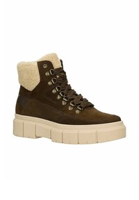 Bruine suède enkellaarzen met een zachte crème voering, metalen veterogen en donkere veters, voorzien van een dikke beige plateauzool.