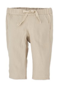 Pantalones cortos texturizados beige con cintura elástica y cordón, que cuentan con dos bolsillos laterales y un corte a la altura de la rodilla.