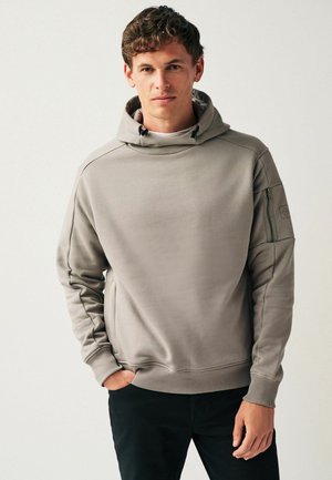 Light grey hooded sweatshirt with a kangaroo pocket and ribbed cuffs. Features a zippered sleeve pocket and smooth texture.