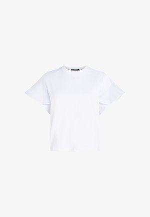 Balta trumpa rankovėmis marškinėlė, su apvaliu kaklu ir pūstomis rankovėmis. Pagaminta iš minkštos medžiagos, su subtiliu logotipo akcentu priekyje.