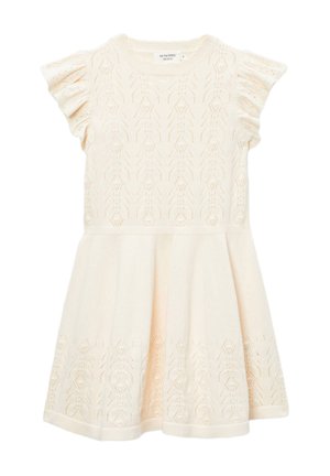 Robe en maille couleur crème avec manches courtes à volants et délicats motifs géométriques en dentelle sur le corsage et les bords de la jupe.