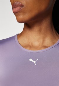 Puma STRONG BABY TEE SHORT - Sportfelső - pale plum