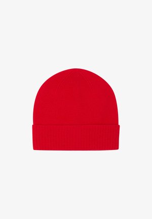 Bonnet en tricot rouge avec un ourlet côtelé, un couronne arrondie et une texture lisse. Présente des coutures visibles minimes et une couleur uniforme.