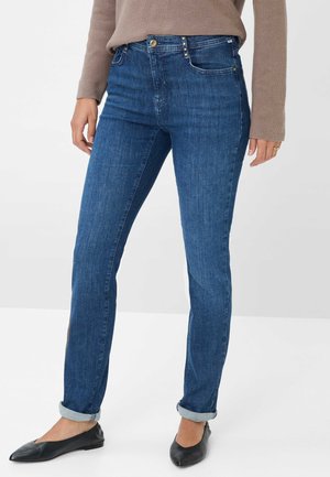 Dunkelblaue Jeans mit schmaler Passform, klassischem Fünf-Taschen-Design, Knopfverschluss mit metallischen Akzenten und umgeschlagenen Säumen.
