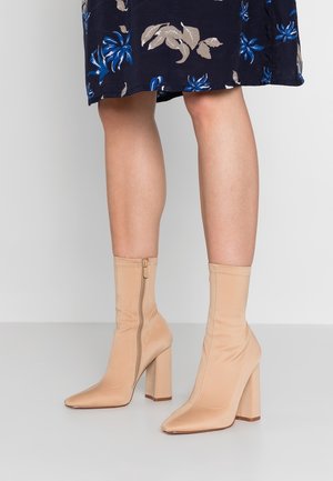High heeled ankle boots - nude