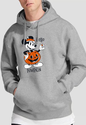 Grauer Hoodie mit einem Cartoon-Charakter, der einen Kürbis hält, in orange und schwarzen Akzenten. Der Text lautet "Hallo Kürbis." Vorne mit Kängurutasche.