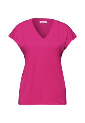 Camiseta de mujer de manga corta y cuello en V en color rosa brillante, con corte holgado y una pequeña etiqueta de la marca en el interior del cuello.