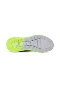 Suela de zapato con un vibrante color verde lima de goma, con patrones texturizados, surcos, y una entresuela gris para flexibilidad y agarre.