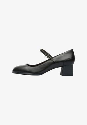 Black leather Mary Jane style shoe with a rounded toe, a single adjustable strap, and a short block heel. Smooth texture, minimal detailing.