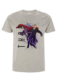 Camiseta de algodón gris con un gráfico impreso de un personaje con un traje negro y una capa roja, rodeado de salpicaduras moradas y la palabra "THOR" en letras grandes.