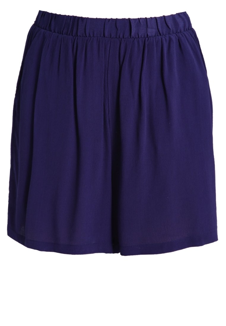 Shorts larges bleu foncé avec une taille élastique et de doux plis à l'avant.