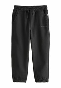 Schwarze Sweatpants aus weichem Stoff, mit elastischem Bund, Kordelzug, Seitentaschen und dem Textdetail "LTD. EDITION".