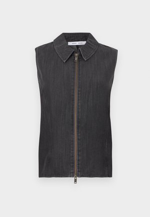 Musta varrukateta teksavest klassikalise krae, esiosa tõmbluku, tekstuurse kangaga ja sirge lõikega.