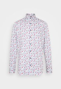 Chemise à manches longues en tissu blanc avec un motif floral en rose, bleu et jaune. Comprend un col et des boutons sur le devant.