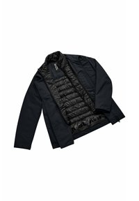 Black outer jacket with an insulated quilted inner layer. Features zippered front, stand collar, and hidden pockets. Smooth texture.