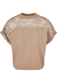 Kurzärmliges Oberteil mit einem beigen Baumwollkörper und einer Spitzenüberlage an den Schultern, mit einem Rundhalsausschnitt und lockerer Passform.