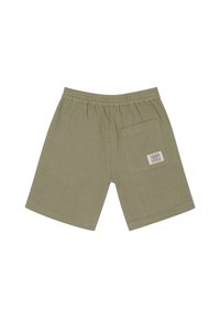Shorts vert olive en tissu texturé, dotés d'une taille élastique et d'une poche arrière avec un détail d'étiquette.