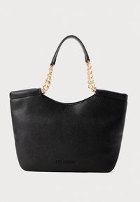 Black leather tote bag with a pebbled texture, featuring a curved top, gold chain handles, and embossed logo on the front.