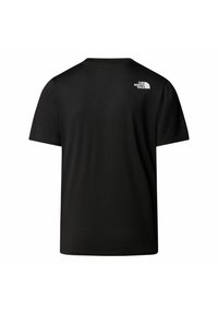 Camiseta negra de manga corta hecha de tejido suave, con un pequeño logo blanco en la parte superior de la espalda. Diseño clásico de cuello redondo.