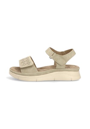 Sandalia beige de punta abierta con plantilla acolchada, correas ajustables de velcro y suela gruesa texturizada para mayor comodidad.