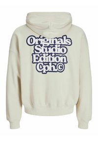 Felpa color crema con una grande grafica testuale navy sul retro. Il materiale sembra morbido con una vestibilità normale e polsini a coste.