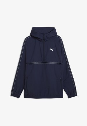 Dunkelblaue Kapuzenjacke von Puma mit weißem Logo auf der Brust, Frontreißverschluss, Seitentaschen und weißen Paspeln entlang der Ärmel und der Brust.