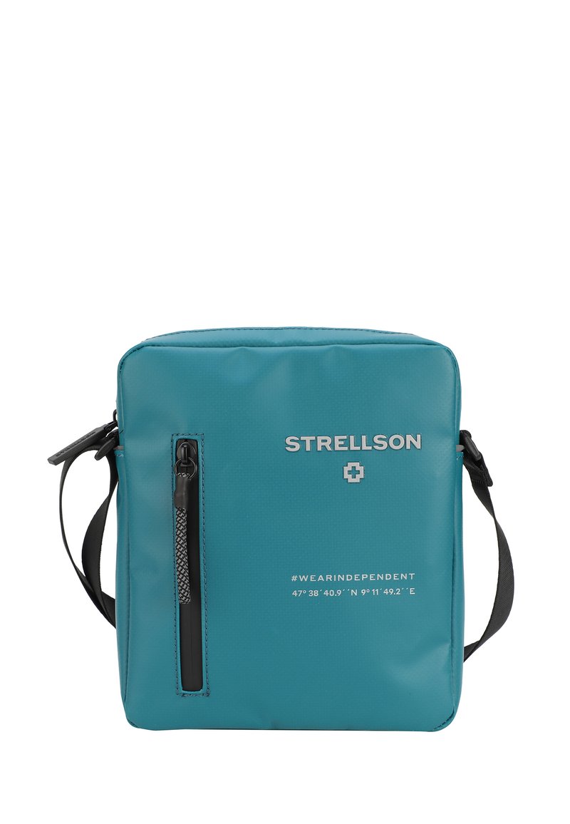 Teal firkantet messenger taske, lavet af glat, vandtæt materiale. Har en frontlomme med lynlås, justerbar rem og prægede logo detaljer.