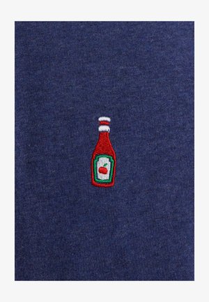 Navy fabric featuring a small embroidered ketchup bottle in red, green, and white with a cherry icon on the label.