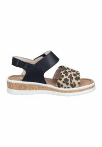 Sandale à bout ouvert noire et imprimé léopard avec des brides réglables et une semelle à texture de liège avec une bande de roulement blanche.