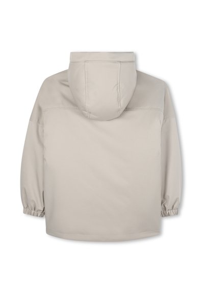 Veste coupe-vent beige avec capuche. Dotée de poignets élastiques et d'une texture lisse. Design simple et minimaliste sans logos visibles.