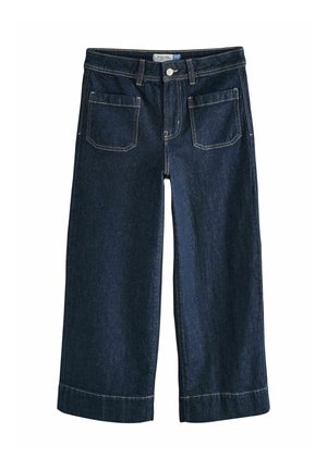 Plati kojos džinsai iš tamsaus džinsinio audinio, su mygtukų užsegimu, penkiomis kišenėmis ir kontrastinga siūle. Pagamintas su apverstais hem ir laisvu kirpimu.