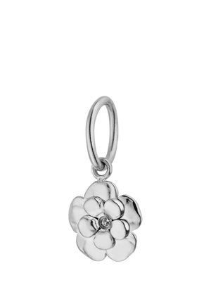 Silver flower-shaped charm with a small central gem, attached to a round loop for hanging on a bracelet or necklace.
