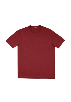 Camiseta de algodón burdeos con mangas cortas, cuello redondo y una textura suave. Diseño sencillo, sin patrones ni acentos visibles.