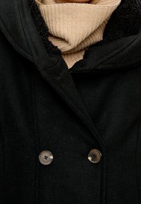s.Oliver Abrigo de invierno - black