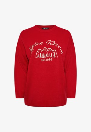 Pull en laine rouge avec un col rond, affichant "Alpine Resort" et un graphique de montagne en blanc, avec des poignets et un ourlet côtelés.