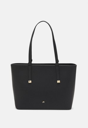 Sac fourre-tout rectangulaire noir avec deux bretelles, détails en matériel doré et petit logo doré au centre avant.