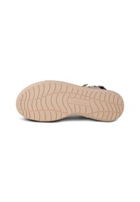 Beige rubber outsole with a textured, patterned design and grooves for traction; flat profile with a slight curve at the toe.