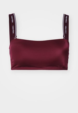 Bordo bralette izrađen od glatkog, rastezljivog materijala sa širokim trakama koje sadrže „Calvin Klein” brendiranje i pravokutni, prilagođeni dizajn.
