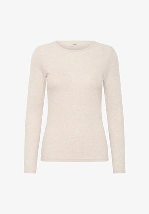 Haut côtelé à manches longues couleur crème avec col rond, silhouette ajustée et petite étiquette de marque à l'intérieur du col arrière.