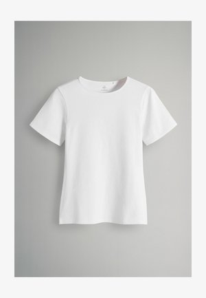 T-shirt blanc à manches courtes en coton doux. Il possède un col rond et une coupe droite, avec des détails de couture minimaux et sans motifs.